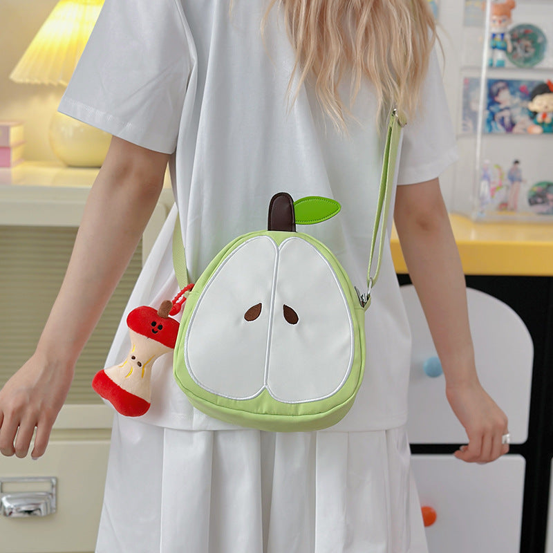 A multi-purpose red apple KT cat shoulder bag